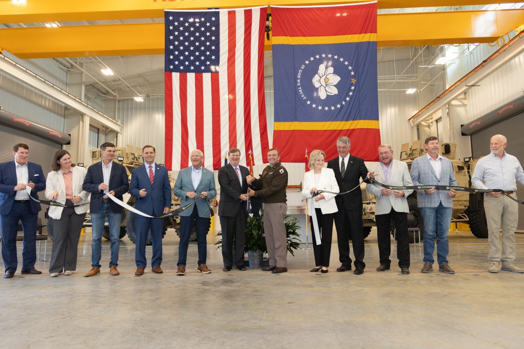 The Mississippi National Guard hosted a ribbon cutting ceremony today, August 21, 2024, to unveil the new Field Maintenance Shop (FMS #9) in Brandon. Maj. Gen. Bobby M. Ginn, the adjutant general of Mississippi, was joined by Gov. Tate Reeves, Sen. Roger Wicker, Sen. Cindy Hyde-Smith, Rep. Michael Guest, and other state and local officials to celebrate the grand opening of this facility. (U.S. Army National Guard photo by William Valentine, MSNG Public Affairs)(Pictured Left to Right: Tom Troxler, Rankin First; Kimberly Buford, JBHM Architecture; Brad Calhoun, Rankin County Supervisor; Congressman Michael Guest; Senator Roger Wicker; Governor Tate Reeves; Maj. Gen. Bobby Ginn, MSNG Adjutant General; Senator Cindy Hyde-Smith; Mayor Butch Lee, City of Brandon; Steve Gaines, Rankin County Supervisor; Sid Scarbrough, Rankin County Supervisor; Colin Maloney, Century Construction) 