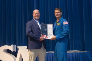 NASA’s Stennis Space Center employee William Berry, a native of Diamondhead, Mississippi, and resident of Picayune, Mississippi, receives the prestigious Space Flight Awareness Silver Snoopy award from NASA astronaut Reid Wiseman during the Aug. 21 ceremony. Photo Credit: NASA/Danny Nowlin