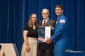NASA’s Stennis Space Center employee Stephen O’Neill, a native and resident of Poplarville, Mississippi, receives the prestigious Space Flight Awareness Silver Snoopy award from NASA astronaut Reid Wiseman during the Aug. 21 ceremony. He is accompanied by his wife, Laura. Photo Credit: NASA/Danny Nowlin