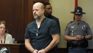 Brett McAlpin, one of six former Mississippi law enforcement officers who pleaded guilty to a long list of state and federal charges enters the Rankin County Circuit Court for the state sentencing for his involvement in the 2023 racially motivated torture of two Black men, April 10, 2024, in Brandon, Miss. (AP Photo/Rogelio V. Solis, file)