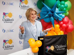 Thames, who was among Junior League of Jackson members raising funds to start what is now the Center for Cancer and Blood Disorders, speaks at the ribbon-cutting for its renovations.