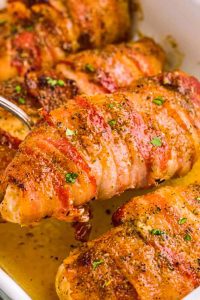 Bacon-wrapped chicken on a bed of dried beef slices is a tasty dinner alternative to frozen or drive-through options. 