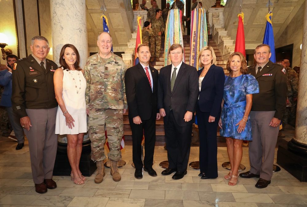 From left, Maj. Gen. Janson D. Boyles, 52nd Adjutant General of Mississippi, his wife Robin Boyles, Congressman and Maj. Gen. Trent Kelly, Congressman Michael Guest, Mississippi’s Gov. Tate Reeves, Mississippi’s First Lady Elee Reeves, Vicki Ginn, and her husband Maj. Gen. Bobby M. Ginn Jr., the 53rd Adjutant General of Mississippi, following an assumption of command ceremony at the Mississippi State Capitol in Jackson, Sept. 6, 2024, where Boyles relinquished command of the Mississippi National Guard to Ginn after eight years in that role. (U.S. Army National Guard photo by Bill Valentine)