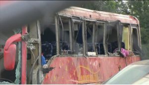 A damaged bus is pictured after overturning on Interstate 20 in Warren County, Mississippi, early Saturday, August 31, 2024. The accident resulted in several fatalities and left dozens injured, according to the Mississippi Highway Patrol. (Photo credit: AP)