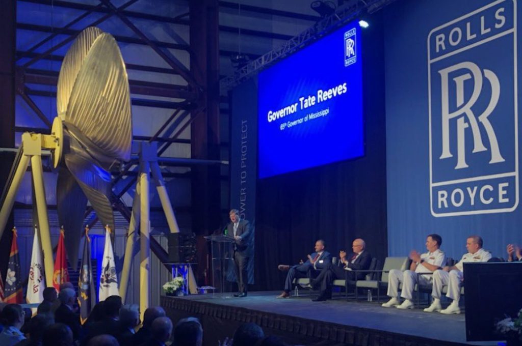 Governor Tate Reeves speaks at an event at the Rolls-Royce Pascagoula facility.