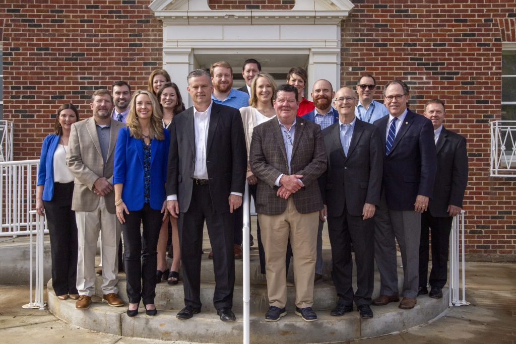 Mississippi State Hospital and the Department of Mental Health recently hosted a visit by legislators to tour the new maximum security Forensic Services building. Pictured (l to r) Front Row: Jake Hutchins, DMH Deputy Executive Director of Behavioral Health Services, Wendy Bailey, DMH Executive Director, Senator Chad McMahan, District 6, Representative Sam Creekmore IV, District 14, Senator Hob Bryan, District 7, James G. “Bo” Chastain, MSH Hospital Director Second Row: Katie Storr, DMH Chief of Staff, Ben Fritz, Public Health and Welfare Committee Attorney, MaCall Chastain, DMH General Counsel, Carla Dearman, MSH Support Services Director, Dr. Tom Recore, DMH Medical Director, Charley Rome, Legislative Budget Office, Kelly Breland, DMH Chief Financial Officer Back Row: Gena Dear, Public Health and Human Services Committee Assistant, Lee Pittman, Legislative Budget Office, Brent Hurley, DMH Director of the Bureau of Behavioral Health Services, Sarah Leath, MSH Forensic Services Clinical Liaison