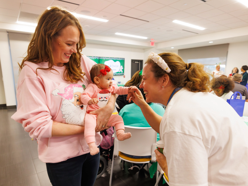 Center for Maternal and Fetal Care hosts holiday reunion for former patients, children