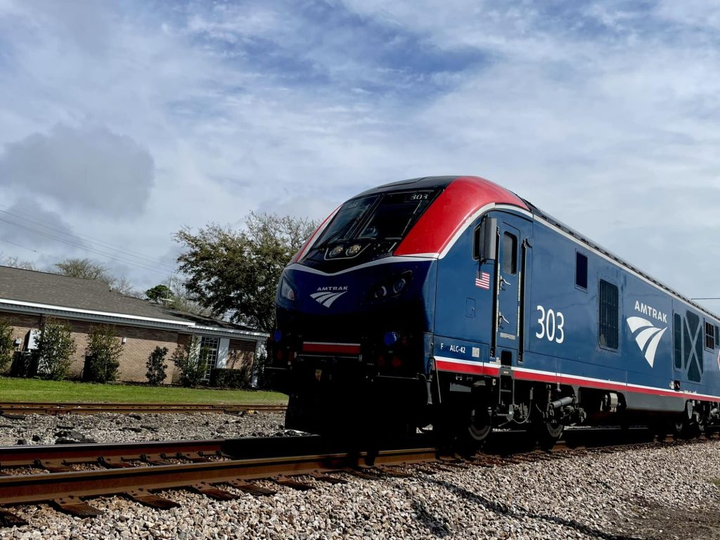 An Amtrak train moves through Pascagoula's downtown in March 2023 (Photo by Frank Corder | Magnolia Tribune)