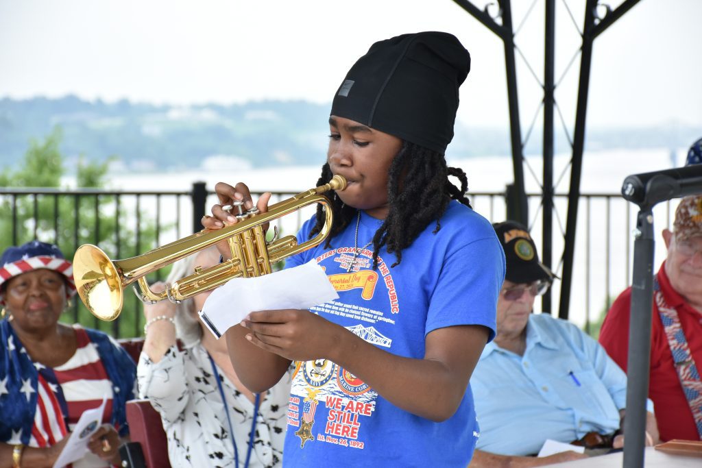 Cayman Riley provided a solo trumpet performance of "When the Saints Go Marching In" at the 2025 Miss-Lou Memorial Day ceremony at the Natchez National Cemetery. Photo by Albert L. Jones.