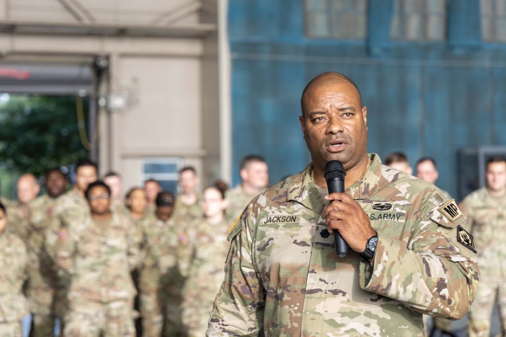 Lt. Col. Steven Jackson, commander of the 112th Military Police Battalion, Mississippi Army National Guard, speaks to members of Task Force Liberty ahead of their mission in the National Capital Region, June 12, 2025, at Thompson Field Air National Guard Base. The task force, which includes Soldiers from the 112th MP Battalion and Airmen from the 172nd Airlift Wing and 186th Air Refueling Wing of the Mississippi Air National Guard, will support the U.S. Secret Service and U.S. Park Police during the Army’s 250th birthday festivities. (U.S. Army National Guard photo by 1st Lt. Jarvis Mace)