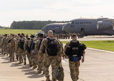 Members of Task Force Liberty begin boarding their plane ahead of their mission in the National Capital Region, June 12, 2025, at Thompson Field Air National Guard Base. The task force, which includes Soldiers from the 112th MP Battalion and Airmen from the 172nd Airlift Wing and 186th Air Refueling Wing of the Mississippi Air National Guard, will support the U.S. Secret Service and U.S. Park Police during the Army’s 250th birthday festivities. (U.S. Army National Guard photo by 1st Lt. Jarvis Mace)