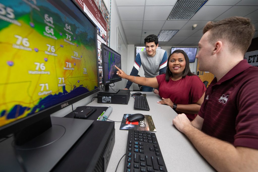 MSU meteorology students work in a Department of Geosciences computer lab. Airmen at Keesler Air Force Base now will have a direct pathway for a new MSU Bachelor of Applied Science in Weather and Environment, allowing for accelerated progress toward a bachelor's degree. (Photo by Beth Wynn)