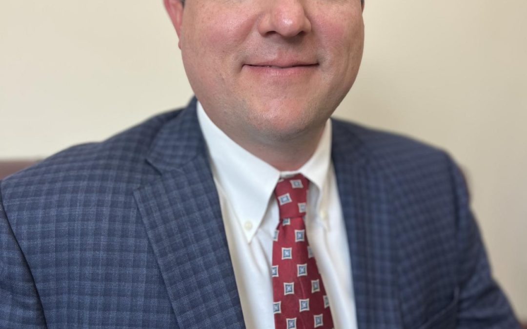 Christopher M. Posey
