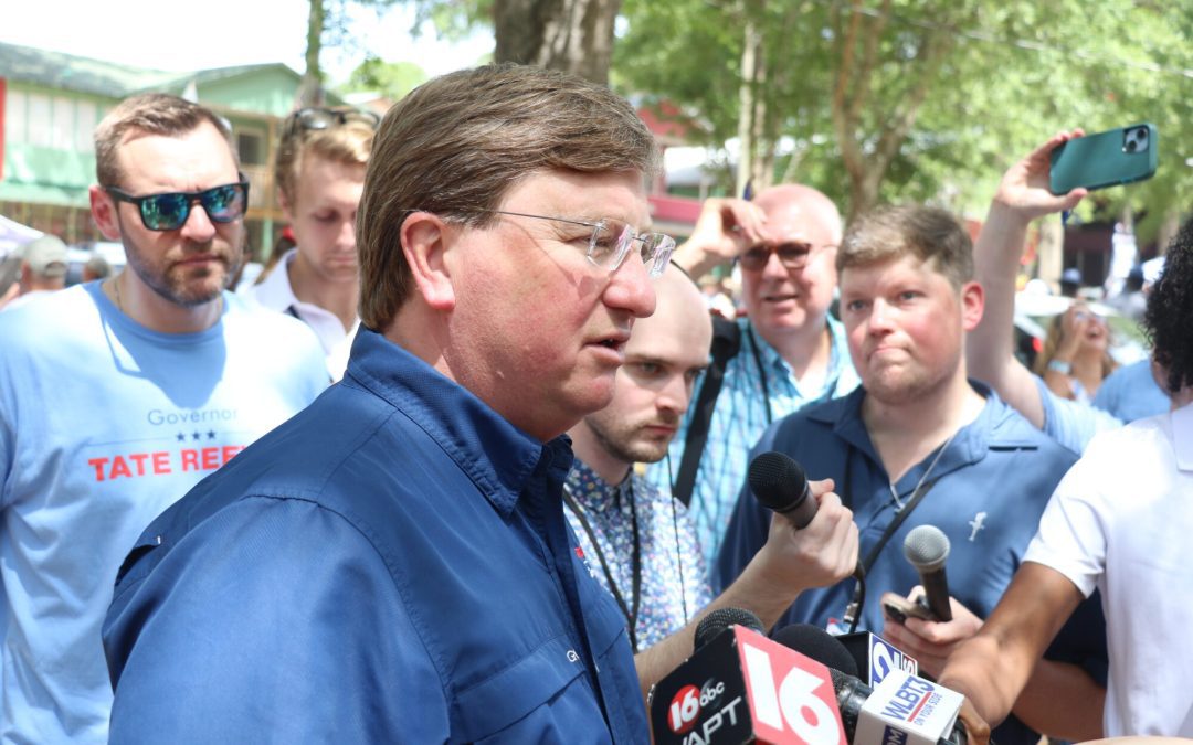 Gov. Tate Reeves addresses members of the press after speaking at the Neshoba County Fair Thursday morning, 2024. (Photo by Jeremy Pittari | Magnolia Tribune)
