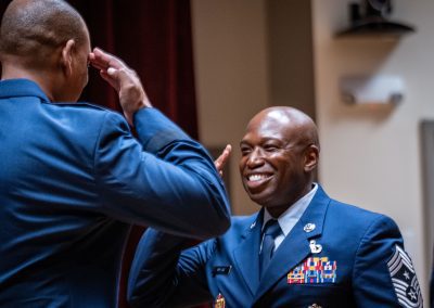 Chief Master Sgt. Kevin Myers, the incoming state command chief, renders a salute to Maj. Gen. Edward Evans, Jr., the assistant adjutant general-Air and commander of the Mississippi Air National Guard, during a Change of Responsibility Ceremony at Joint Force Headquarters in Jackson, Mississippi, Aug. 1, 2025. During the ceremony, Myers became the 15th command chief master sergeant of the Mississippi Air National Guard. (U.S. Air National Guard photo by Senior Airman Shardae McAfee)