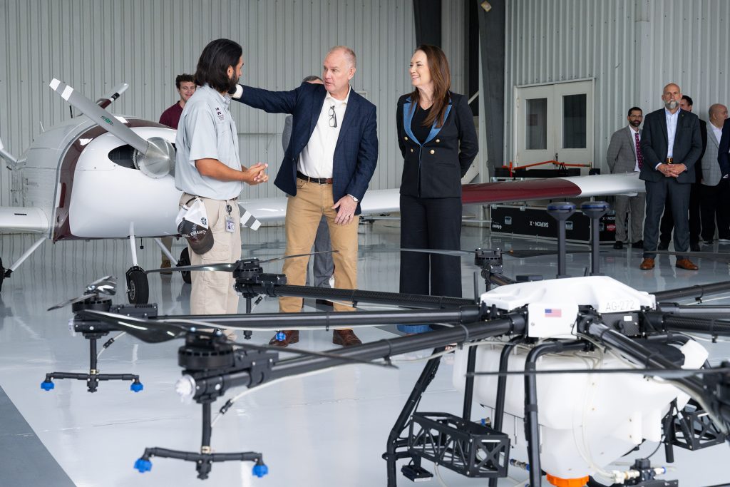 U.S. Secretary of Agriculture Brooke Rollins was briefed on Mississippi State University’s leading research on Uncrewed Aircraft Systems, as well as its groundbreaking work in the area of agriculture autonomy. She viewed the country’s largest and most capable fleet of UAS in academic use. MSU is the lead university for the Alliance for System Safety of UAS through Research Excellence, or ASSURE, and is also home to Raspet Flight Research Laboratory, a key partner in ASSURE, and the nation’s leading academic research center dedicated exclusively to the advancement of UAS. (Photo by Beth Wynn)