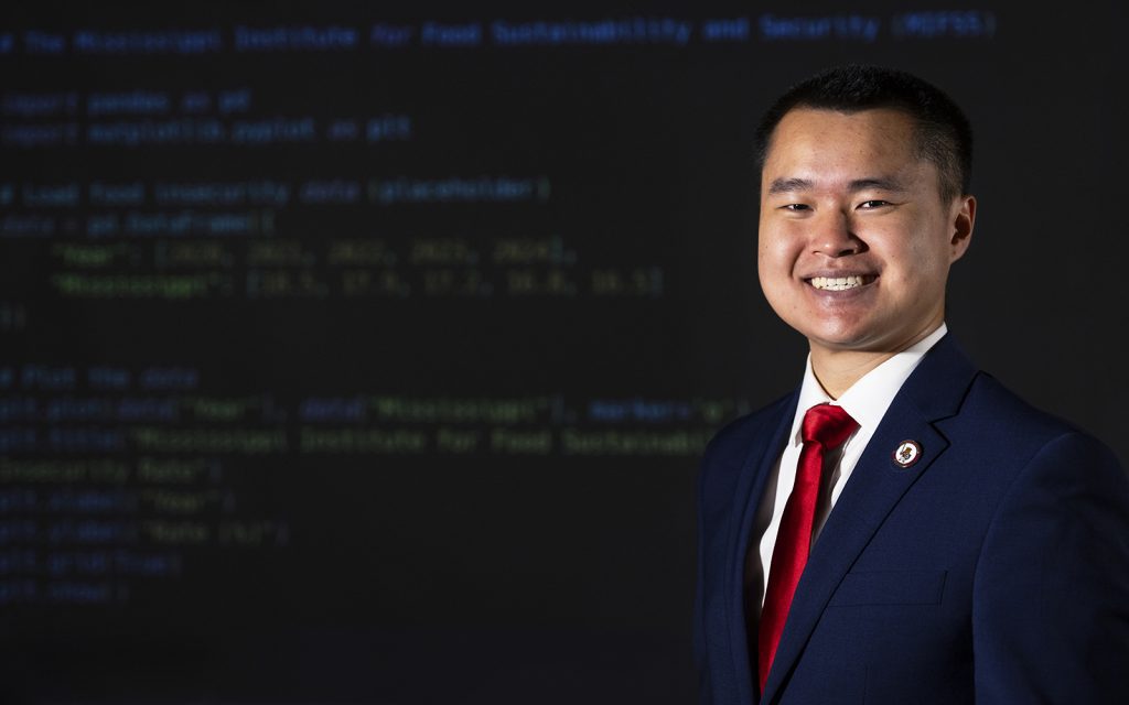 Devin Chen, a junior cybersecurity major from Louisville, is developing a machine-learning program that could help alleviate food insecurity in the state thanks to a partnership with a Mississippi-based food network, artificial intelligence tools powered by Amazon Web Services and the skills he’s learning at Mississippi State. (Photo by Beth Wynn)