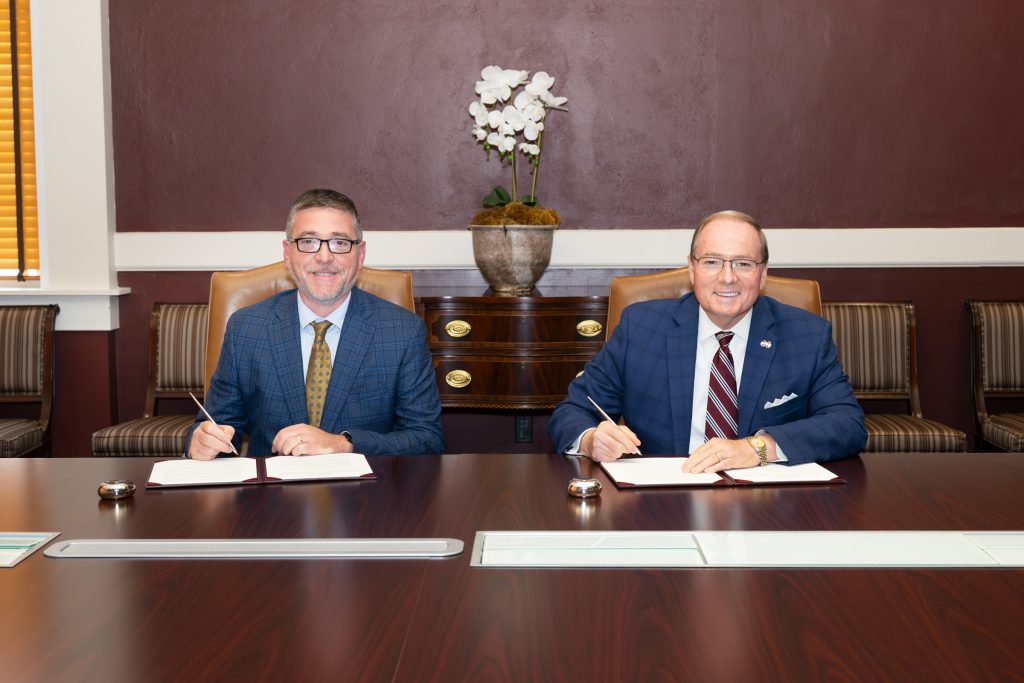 ECCC President Brent Gregory, left, and MSU President Mark E. Keenum signed a memorandum of understanding Aug. 18 to provide a smooth transfer pathway for culinary arts students at the community college to pursue a bachelor’s degree in culinology at the university. (Photo by Beth Wynn)
