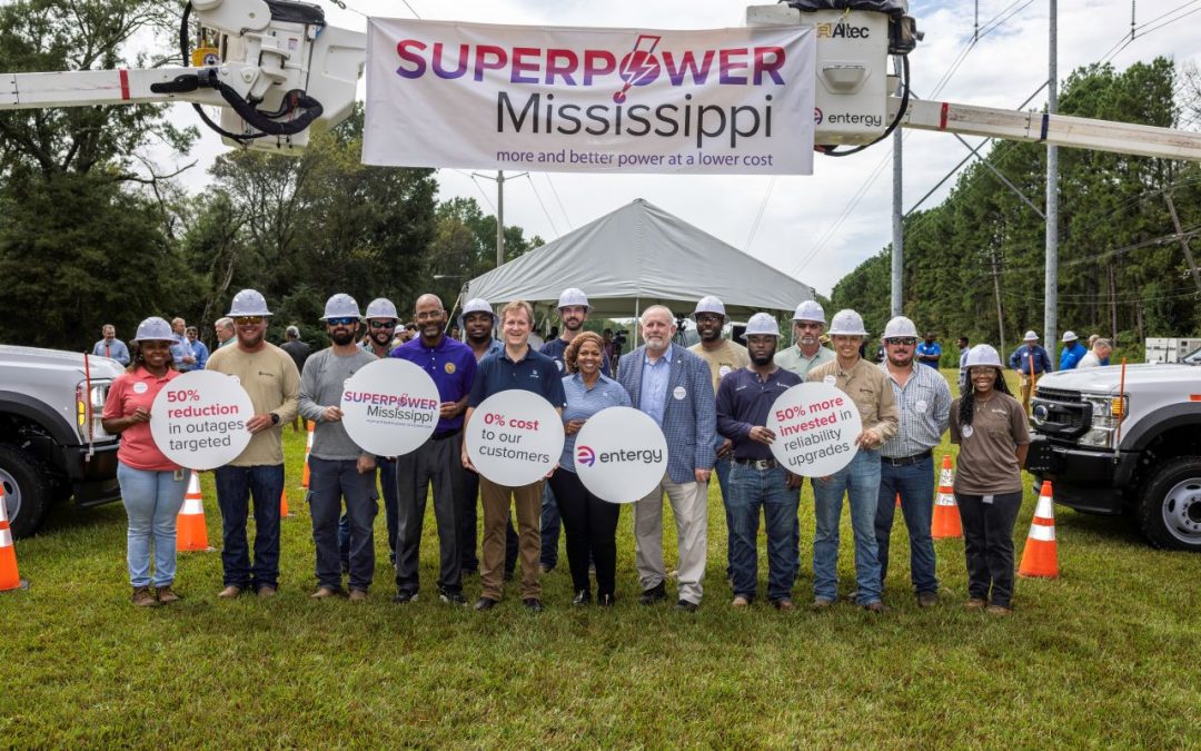 Entergy MS CEO Haely Fisackerly pictured with PSC Commissioners De'Keither Stamps and Wayne Carr as well as Entergy linemen and staff (Photo from Entergy Mississippi on Facebook)