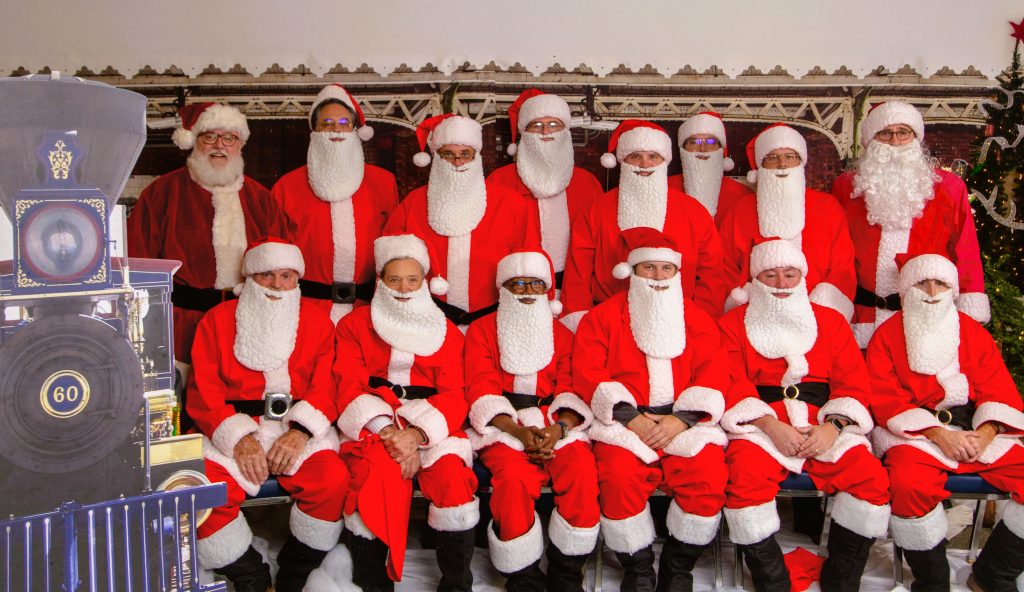2024 Santa Day volunteers preparing to visit each building and bring gifts to the patients and residents at Mississippi State Hospital.