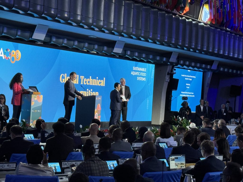 Mississippi State’s Dan Reynolds, associate vice president for international programs, pictured on stage at right and representing the Global Center for Aquatic Health and Food Security, is recognized by U.N. Food and Agriculture Organization Director General Qu Dongyu during the organization’s 80th anniversary celebration Oct. 15. (Photo submitted)