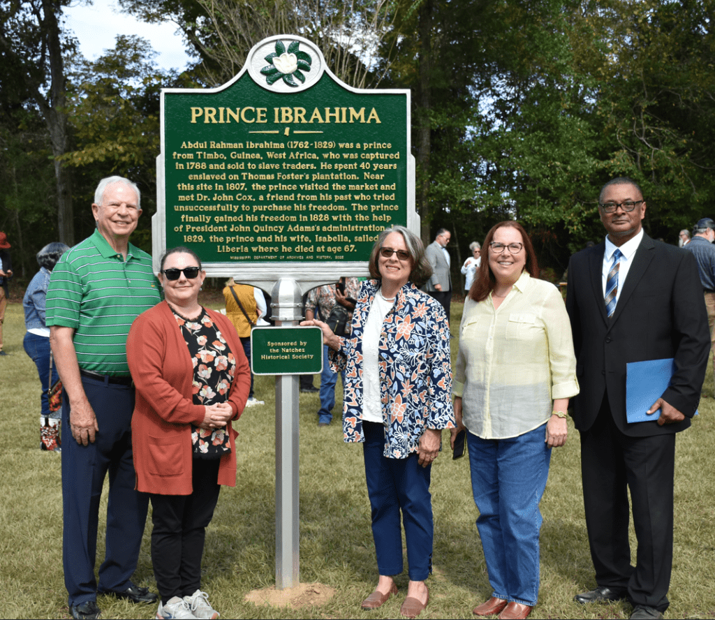 Members of the Natchez Historical Society pose with the historical marker the society funded for Prince Ibrahima. From left are Albert King, Nicole Harris, Karen Hill, Daye Dearing and Dr. Roscoe Barnes III. Photo by Albert L. Jones