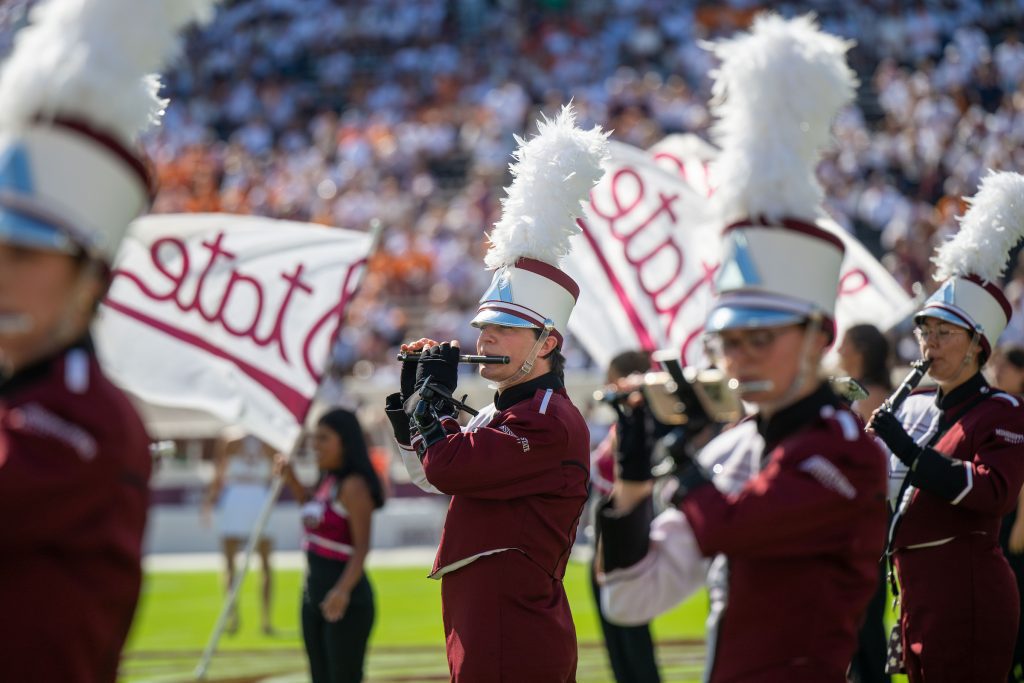 Mississippi State junior Riley Jackson, of Collierville, Tennessee, plays piccolo during a pregame performance this year with the Famous Maroon Band. Adding to its list of national awards, the FMB is the 2026 recipient of collegiate marching band’s highest honor: the national Sudler Trophy. (Photo by Emily Grace McCall)