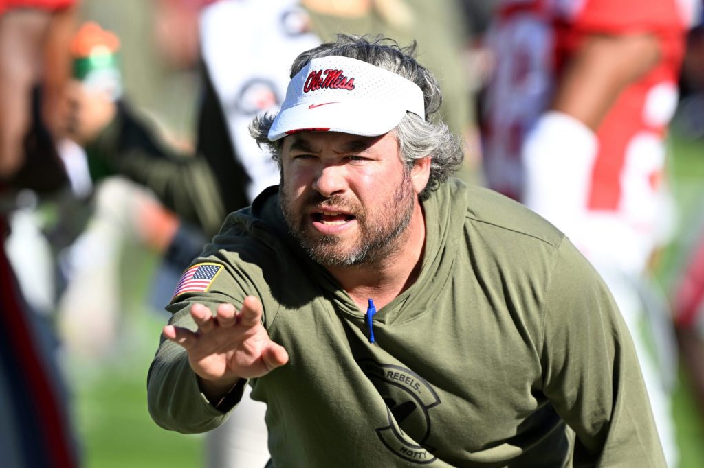 FILE - Mississippi defensive coordinator Pete Golding runs drills during warm ups before an NCAA college football game against Louisiana Monroe in Oxford, Miss., Saturday, Nov. 18, 2023. (AP Photo/Thomas Graning, File)