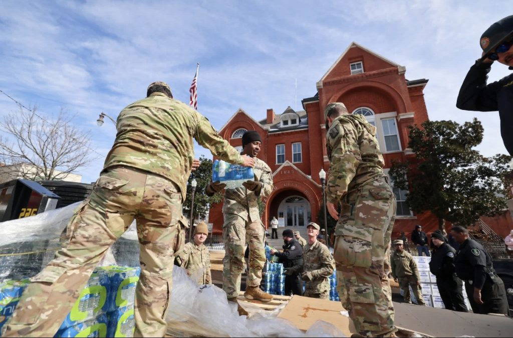 Mississippi National Guard Soldiers distribute bottled water to local officials and communitymembers during winter storm response operations in Oxford, Mississippi, Jan. 29, 2026.
Guardsmen are assisting with the delivery and distribution of essential supplies to support
communities impacted by severe winter weather.
(Photos by the Mississippi National Guard)