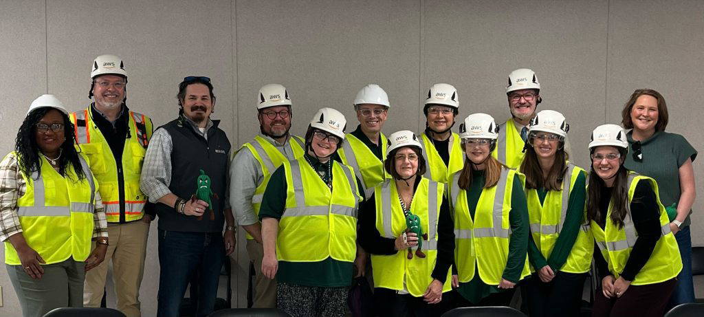 (L to R) Glendscene Williams, Joe Lackey, MCEDA COO Larkin Simpson, Kevin Entrekin, Zina Taran, DSU President Dan Ennis, Vicki Bingham, Leslie Griffin, Heather Miller, Jeffrey Leffler, Merideth VanNamen, Kristen Land and Workforce Director at CMPDD Robin Parker recently toured the Amazon Web Services data center in Ridgeland.