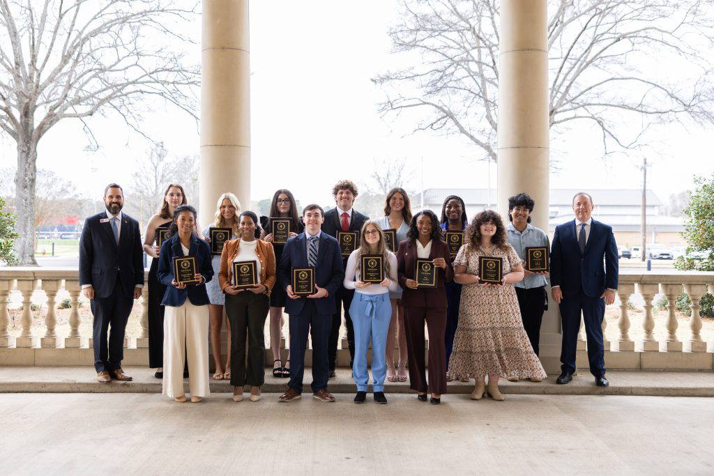 Members of the 2025-26 Northwest Mississippi Community College Hall of Fame are congratulated by Northwest President, Dr. Michael J. Heindl (far left) and Northwest Board of Trustees Chairman Cory Uselton (far right). Photo by Carly Fox