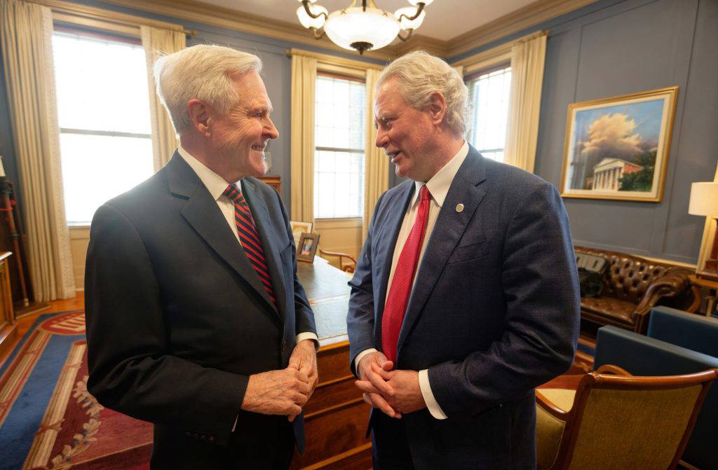 Former Mississippi Gov. Ray Mabus (left) and University of Mississippi Chancellor Glenn Boyce chat in the chancellor's formal office. The university has named its political science department in honor of Mabus. Photo by Hunt Mercier/Ole Miss Digital Imaging Services