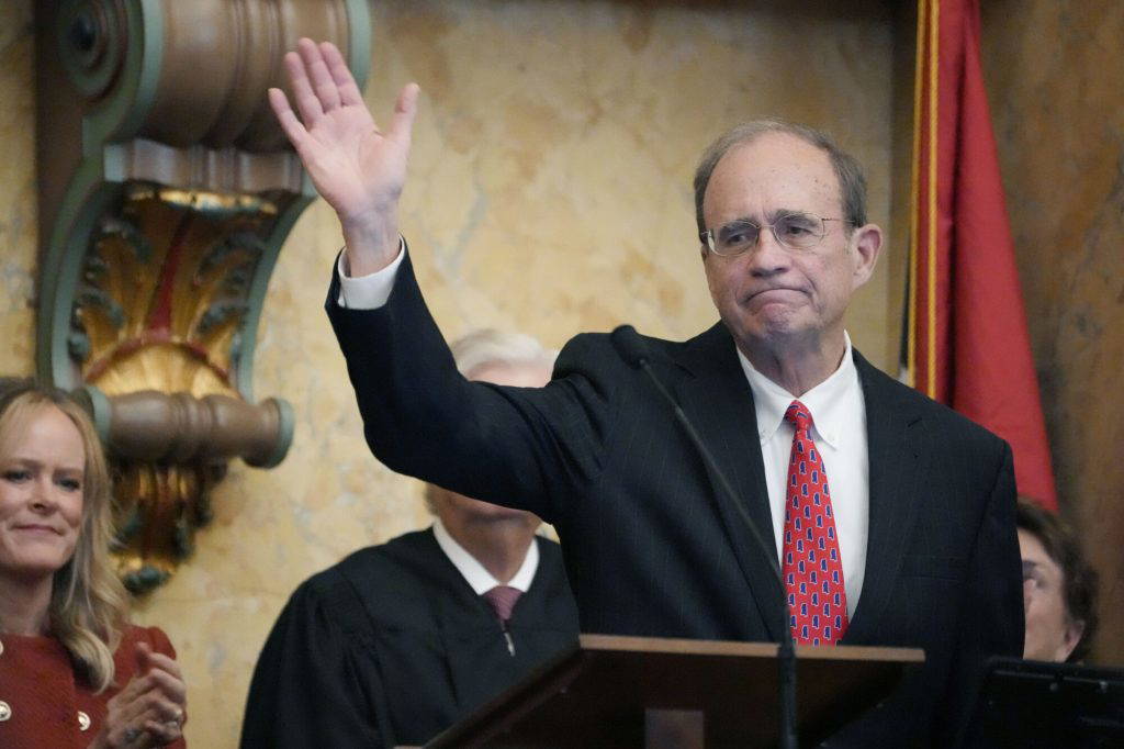 Mississippi Lt. Gov. Delbert Hosemann waves to lawmakers in the joint session of the Mississippi Legislature after delivering his speech, moments after reciting the oath of office for his second term, Thursday, Jan. 4, 2024, in the Mississippi House Chamber at the Mississippi State Capitol, in Jackson, Miss. (AP Photo/Rogelio V. Solis)