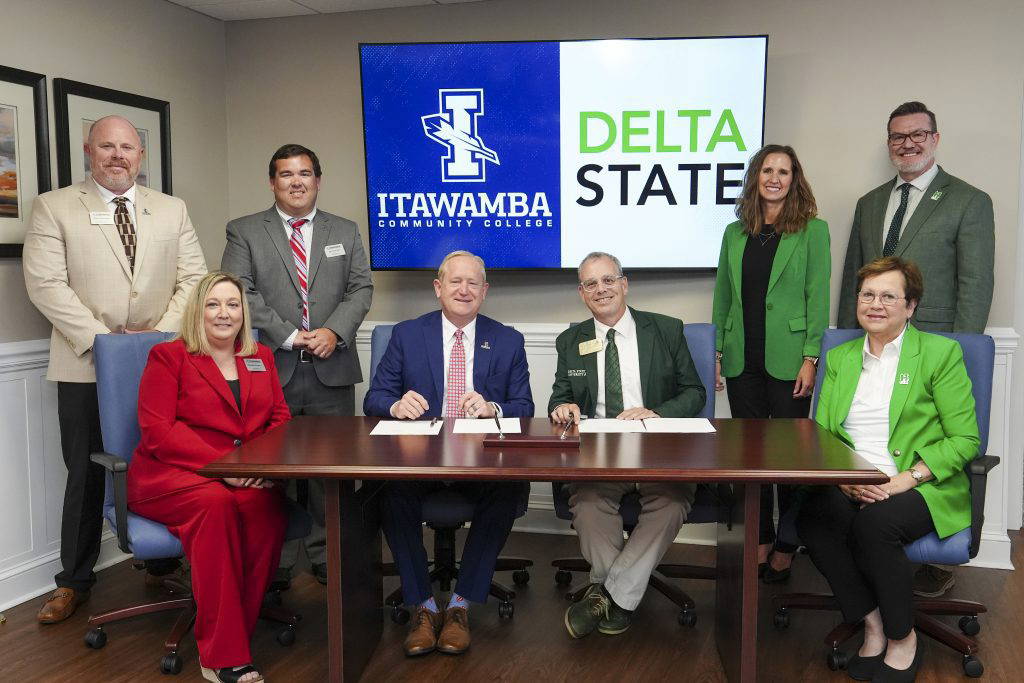 Leaders from Itawamba Community College and Delta State University pose following the signing of two memorandums of understanding on the Fulton Campus. Front row, from left, are Michelle Clouse, vice president of instructional services at ICC; Jay Allen, ICC president; Dan Ennis, DSU president; and Leslie Griffin, provost and vice president for academic affairs at DSU. Back row, from left, are Chris Stevenson, dean of academic instruction at ICC; Chris Cox, education department lead at ICC; Merideth Van Namen, dean of the College of Education at DSU; and Jeffrey Leffler, associate provost and vice president for academic affairs at DSU. Photo by CJ Adams, ICC Community Relations
