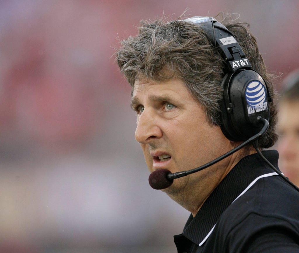 FILE - Texas Tech head coach Mike Leach looks at the scoreboard during the first quarter of a football game against SMU, Sept. 3, 2007, in Dallas. (AP Photo/Matt Slocum, file)