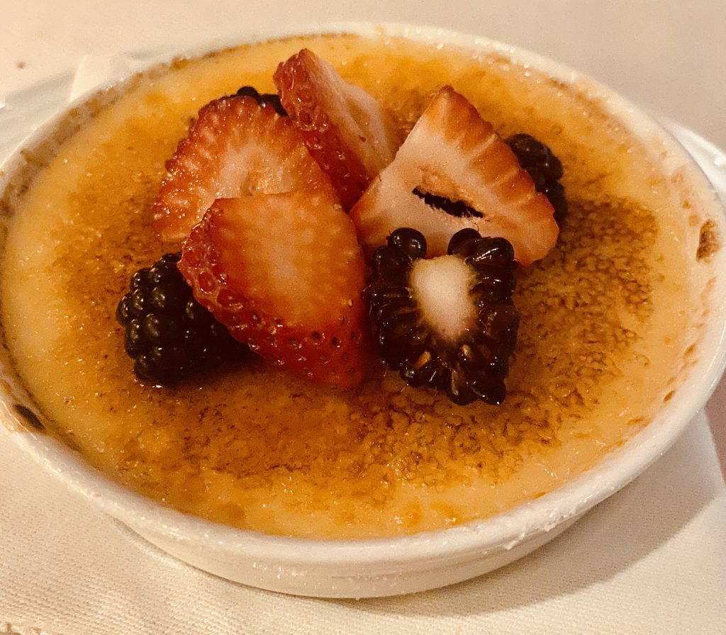 A decadent dessert of crème brulee topped by berries was the perfect ending to an amazing dinner at BR Prime Steakhouse. (Photo by Kara Kimbrough)