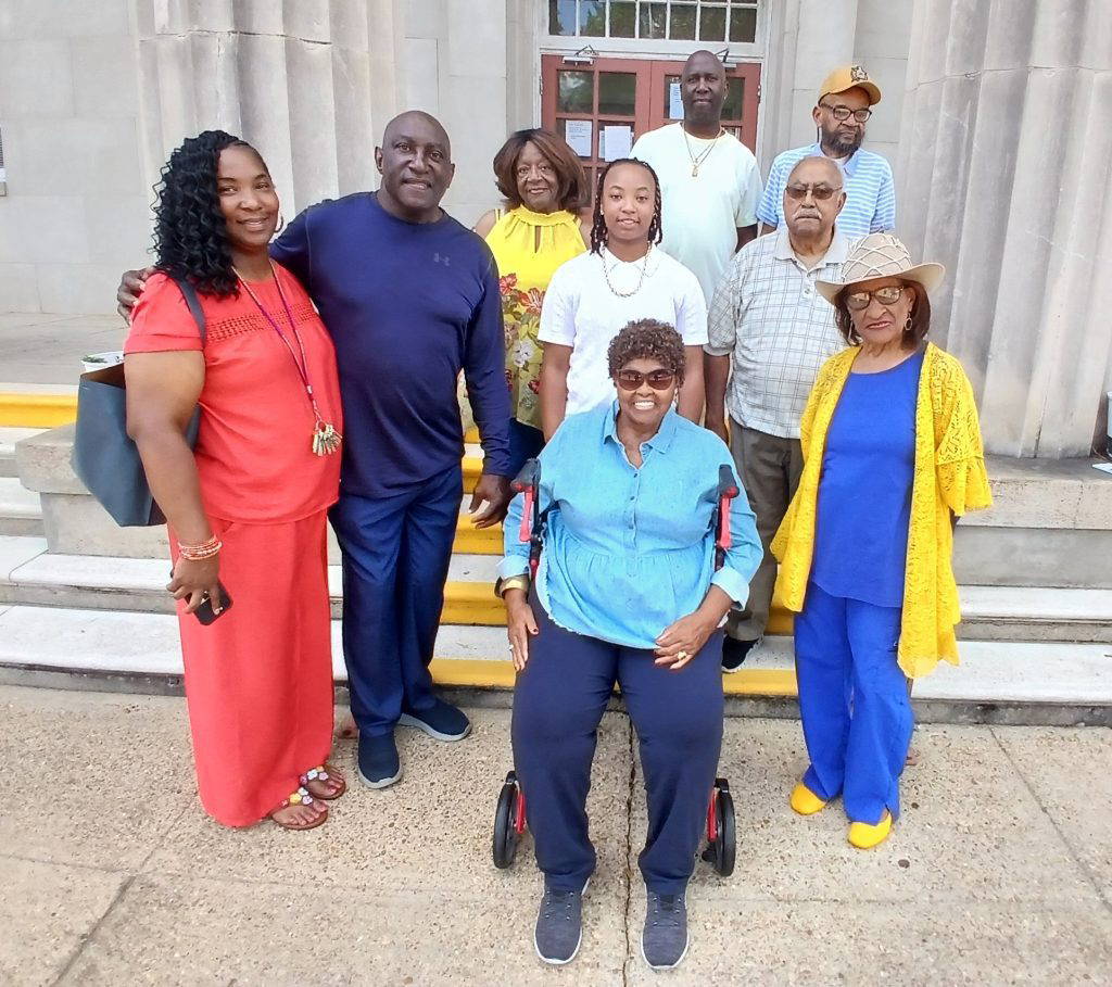 The Hugh Green Scholarship Foundation committee presents the 2026 $1,000 Hugh Green Scholarship to Natchez High senior Jayda Myles (third from left). Pictured from left (front row) are Galaundra Myles, Hugh Green, Jayda Myles, Laura Ann Jackson (seated), and Eva Dunkley. Back row from left: Josie Gilchrist, David Myles, and Phillip West.Photo by Roscoe Barnes III