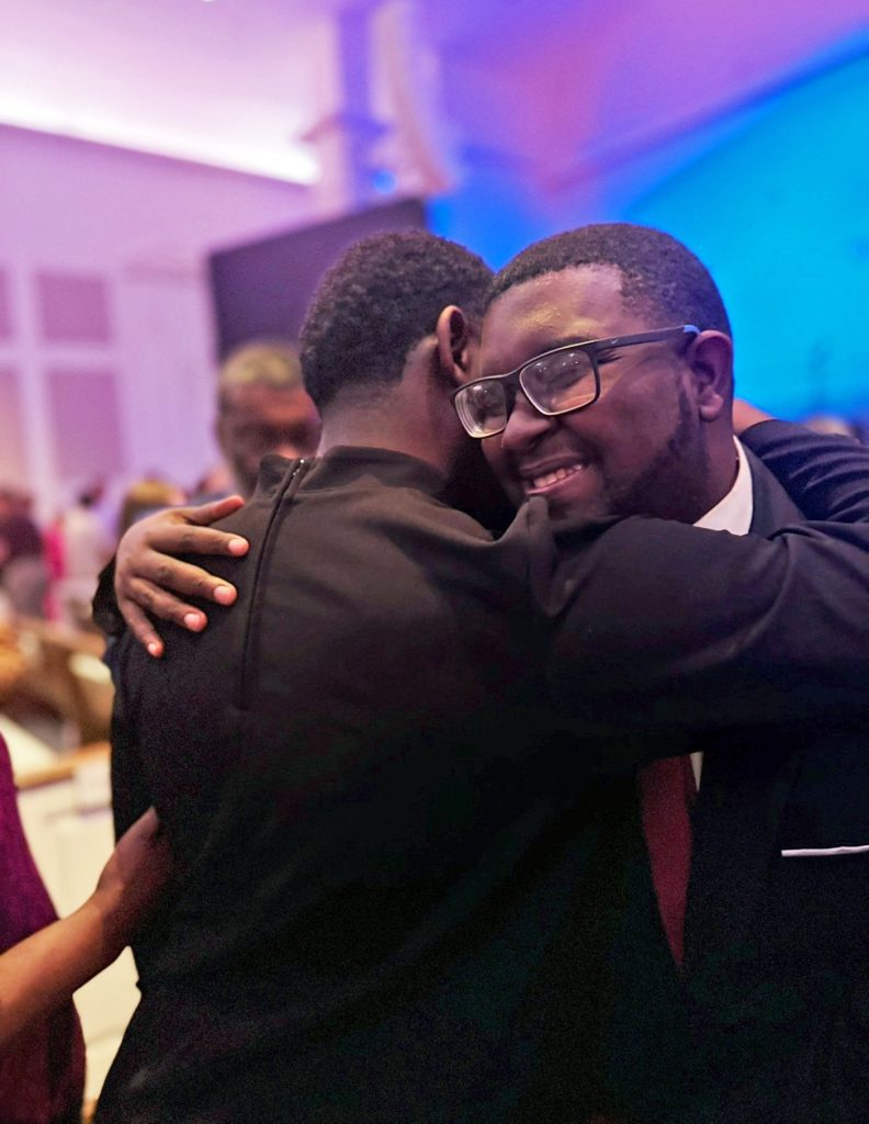 Twin brothers Kirklyn, left, and Kirk Johnson celebrate following Kirklyn’s senior music recital at Mississippi State. Diagnosed with non-verbal autism as toddlers, the brothers used music as a foundation for learning and communication.