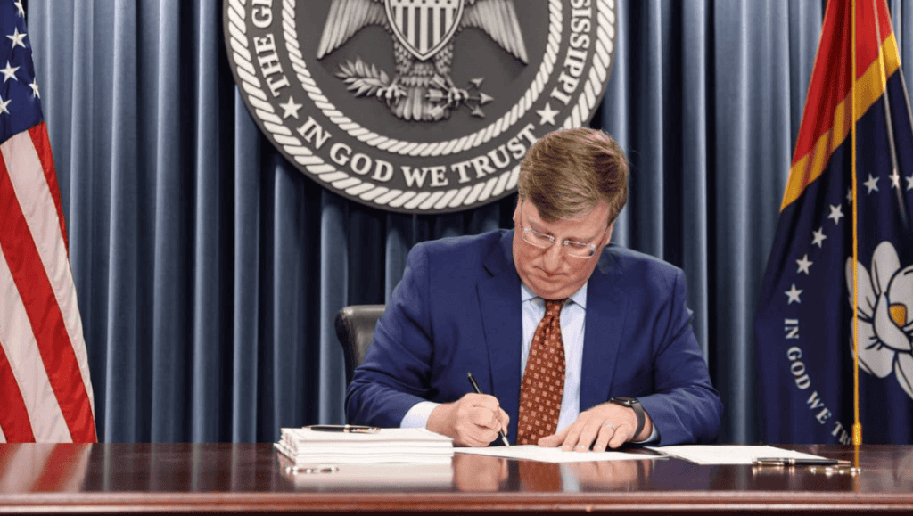 Governor Tate Reeves signs the youth reform bill into law, July 2026 (Photo from Reeves' Facebook page)