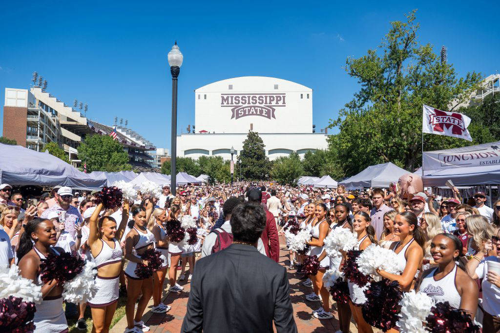 Mississippi State fans cheer on the Bulldogs during a Dawg Walk prior to a home football game. (Photo by Emily Grace McCall)